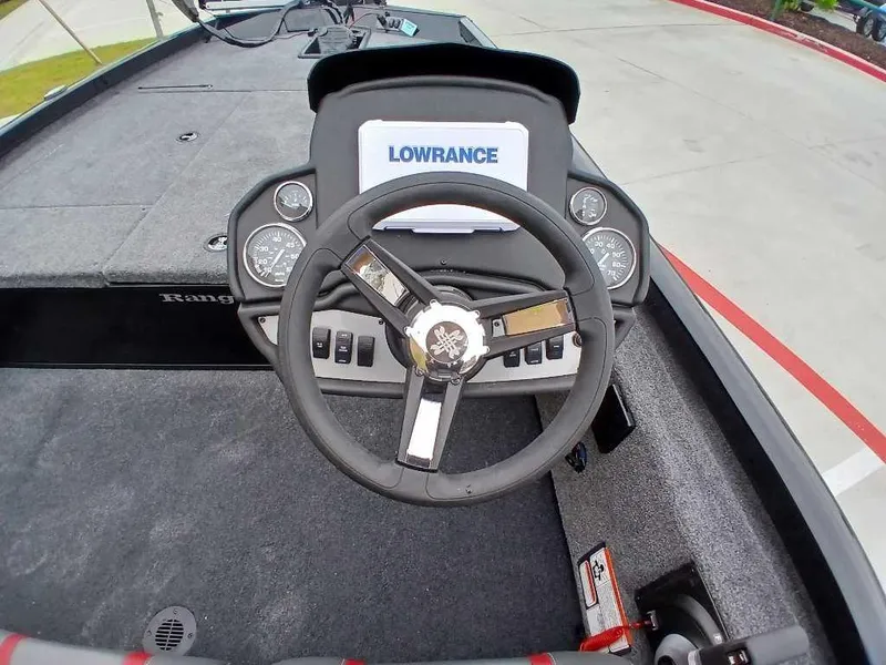 Slide: The Image of Steering console of 2025 Ranger RT188 boat with Lowrance display and gauges. - 3