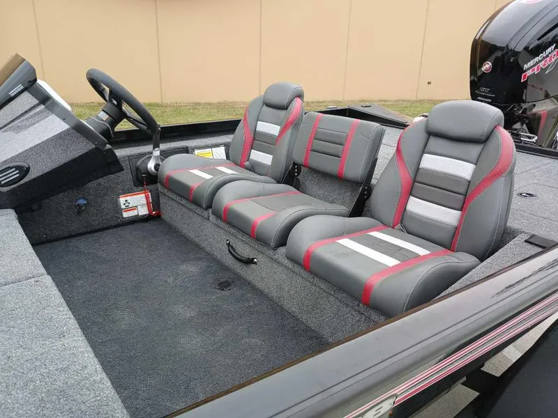 Slide: The Image of 2025 Ranger RT188 boat interior with gray and red seating. - 4