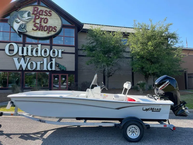 Slide: The Image of 2025 Mako Pro Skiff 17 CC boat outside Bass Pro Shops Outdoor World. - 1