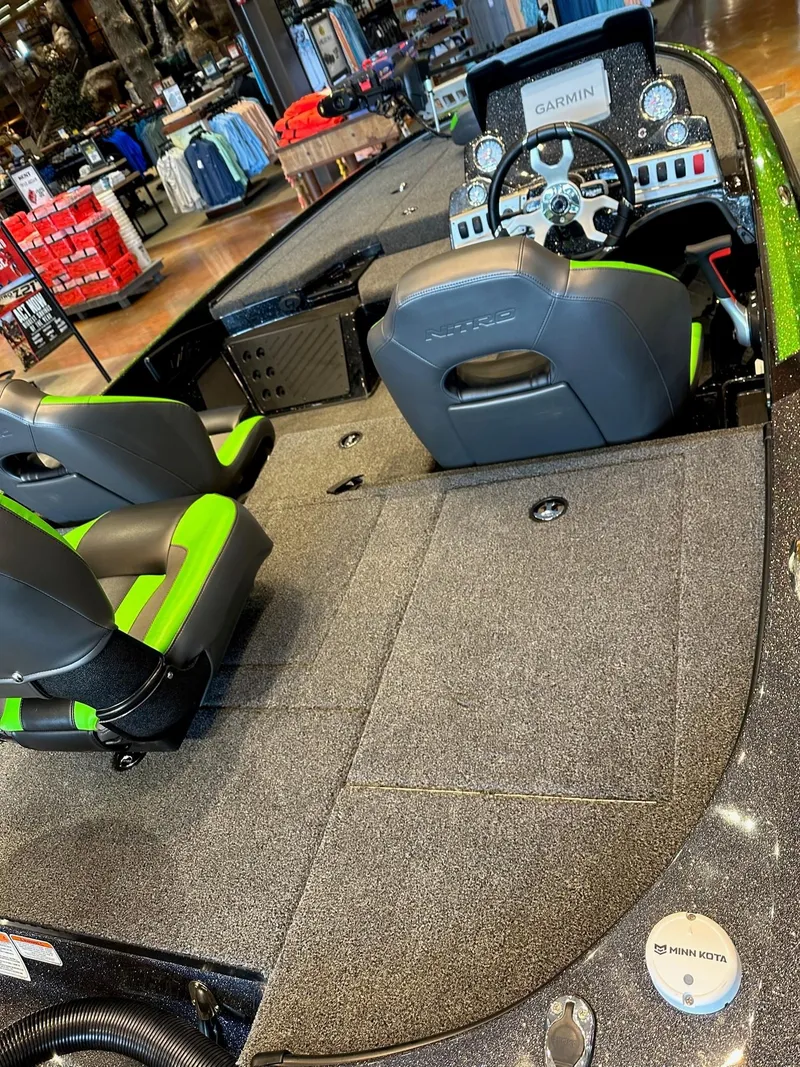 Slide: The Image of 2025 Nitro Z18 Pro boat interior with modern dashboard and seating. - 2