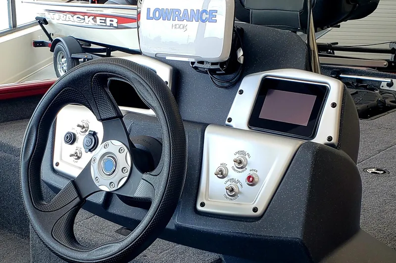 Slide: The Image of Steering console of 2025 Tracker Pro Team 175 boat with Lowrance electronics. - 3