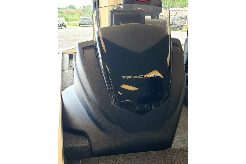 Slide: The Image of 2025 Tracker Pro Team 175 boat console with sleek black design. - 4