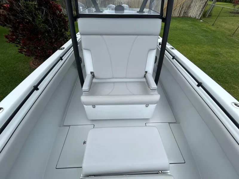 Slide: The Image of 2024 Contender 28 Tournament boat interior with sleek white seating and modern design. - 10