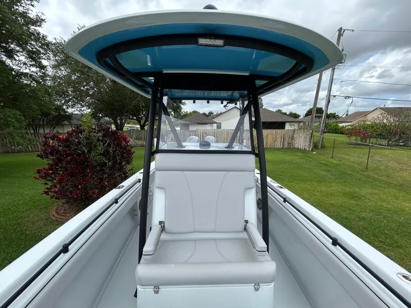 Slide: The Image of 2024 Contender 28 Tournament boat with sleek seating and modern design. - 11