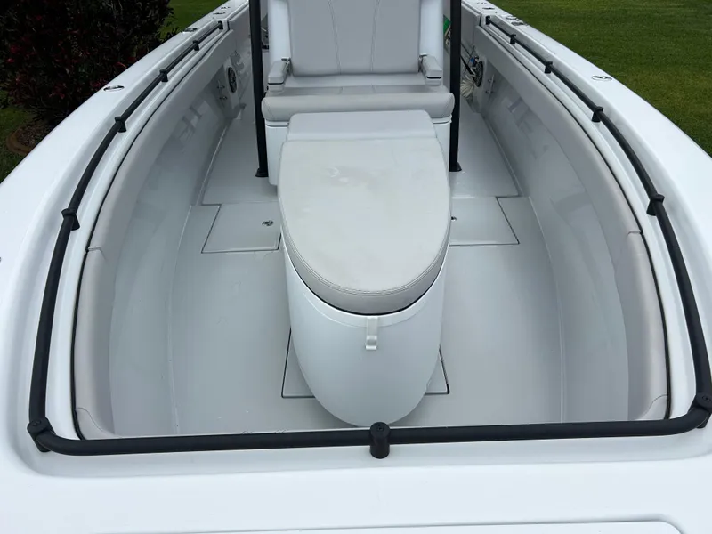 Slide: The Image of 2024 Contender 28 Tournament boat interior with seating and storage. - 7