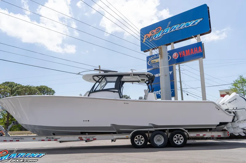 The Image of 2023 Front Runner 39 Center Console boat on trailer at dealership. - 0