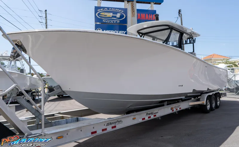 Slide: The Image of 2023 Front Runner 39 Center Console boat on trailer at dealership. - 1