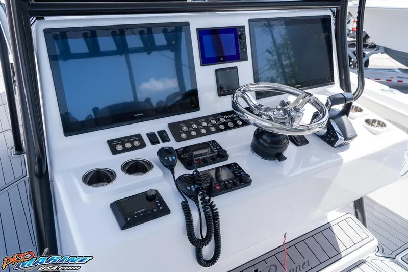 Slide: The Image of 2023 Front Runner 39 Center Console dashboard with advanced navigation and control systems. - 14