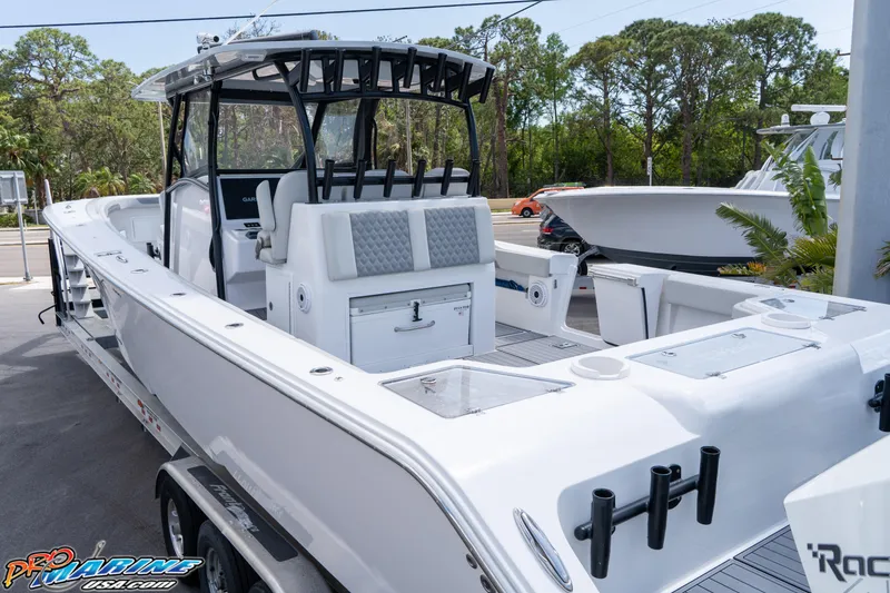 Slide: The Image of 2023 Front Runner 39 Center Console boat, sleek design, spacious deck, outdoor setting. - 17