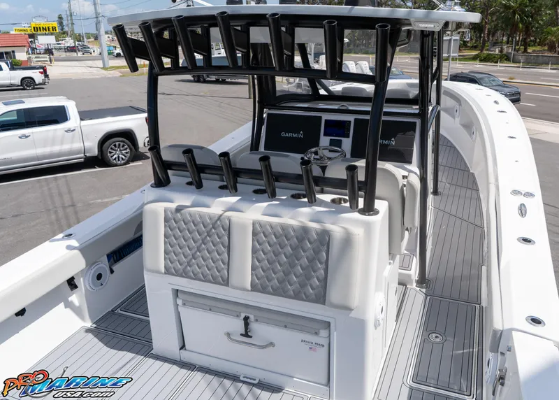 Slide: The Image of 2023 Front Runner 39 Center Console boat with modern seating and advanced navigation systems. - 18