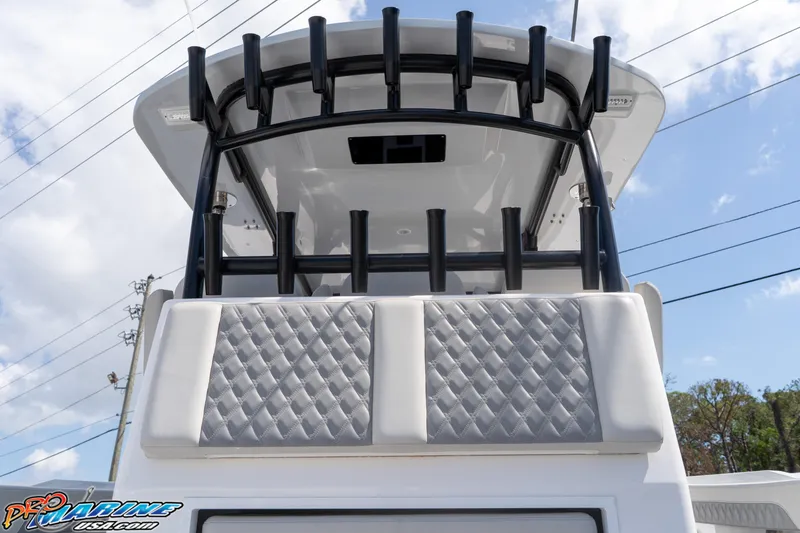 Slide: The Image of 2023 Front Runner 39 Center Console boat with sleek design and cushioned seating. - 19