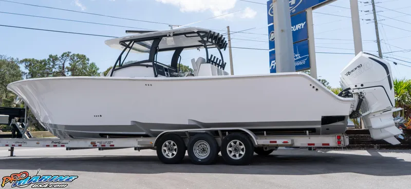 Slide: The Image of 2023 Front Runner 39 Center Console boat on trailer, side view. - 2