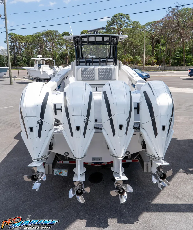 Slide: The Image of 2023 Front Runner 39 Center Console boat with four powerful outboard engines. - 3