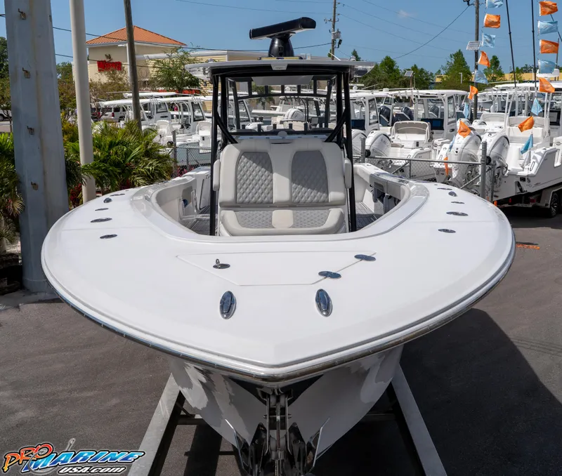 Slide: The Image of 2023 Front Runner 39 Center Console boat displayed at a dealership. - 7