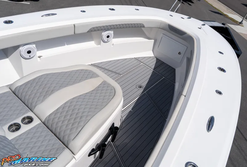 Slide: The Image of 2023 Front Runner 39 Center Console boat interior with cushioned seating and sleek design. - 8