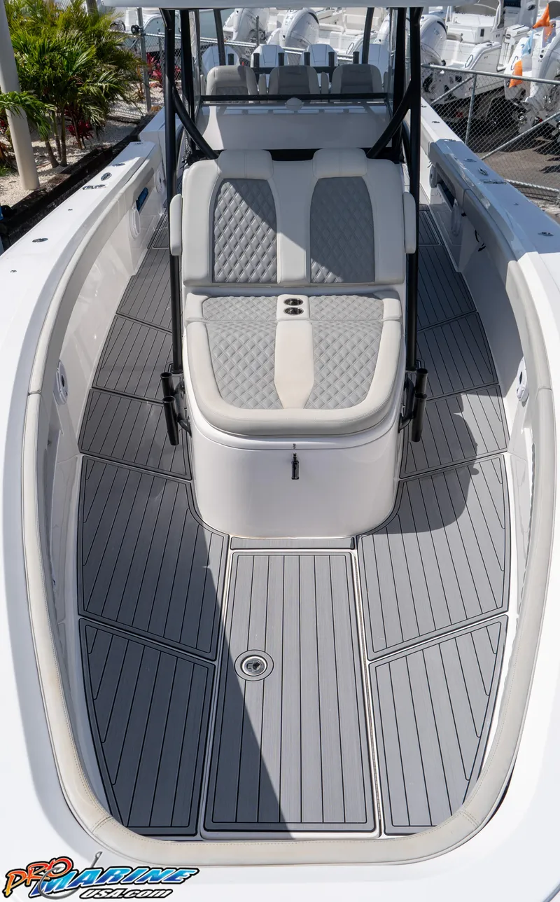 Slide: The Image of 2023 Front Runner 39 Center Console boat with sleek seating and modern deck design. - 9