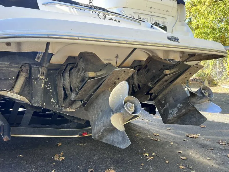 Slide: The Image of Rear view of 2001 Chaparral 285 SSi boat with dual propellers on a trailer. - 2