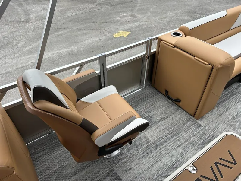 Slide: The Image of 2025 Avalon 2380 Venture Quad Lounger with tan seating and modern design on a pontoon boat. - 9