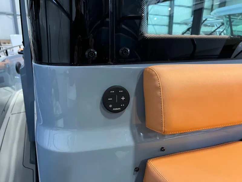 Slide: The Image of 2022 BRABUS Shadow 500 Cabin interior with orange seating and control panel. - 18