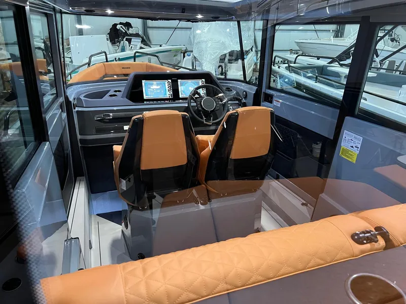 Slide: The Image of 2022 BRABUS Shadow 500 Cabin interior with modern dashboard and luxurious seating. - 32