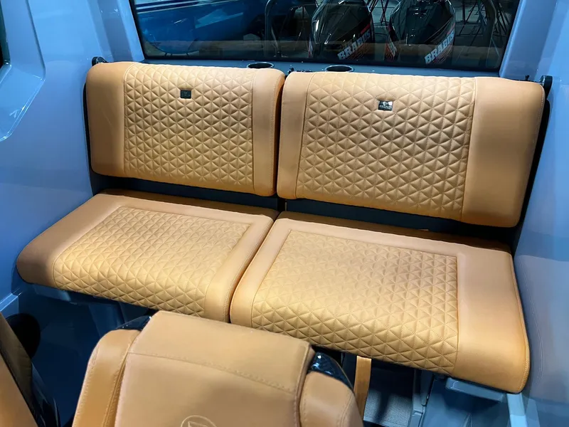 Slide: The Image of Luxurious tan leather seating in 2022 BRABUS Shadow 500 Cabin boat interior. - 41
