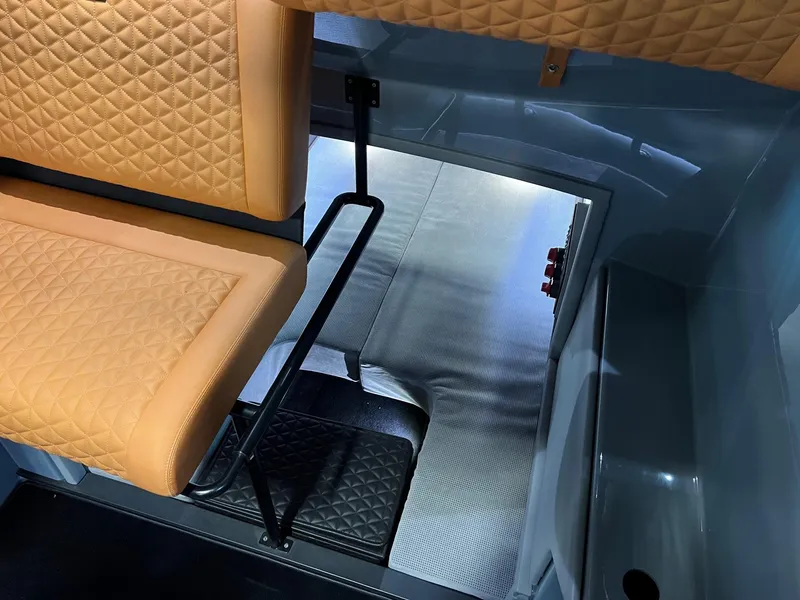 Slide: The Image of 2022 BRABUS Shadow 500 Cabin interior with quilted leather seating and sleek metal flooring. - 44