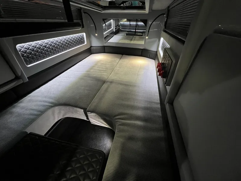 Slide: The Image of 2022 BRABUS Shadow 500 Cabin interior with modern design and ambient lighting. - 45