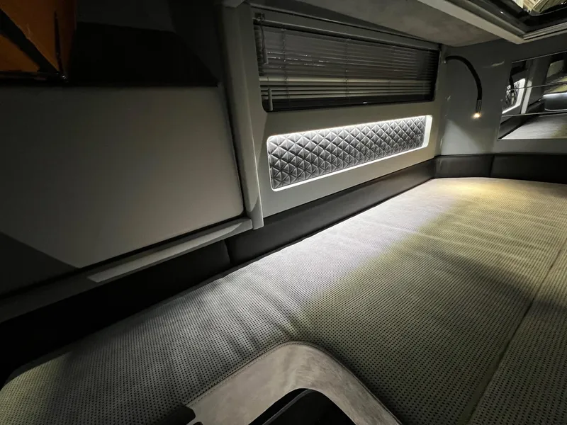 Slide: The Image of 2022 BRABUS Shadow 500 Cabin interior with modern design and ambient lighting. - 46