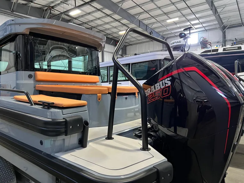 Slide: The Image of 2022 BRABUS Shadow 500 Cabin boat with powerful engine in a showroom. - 8