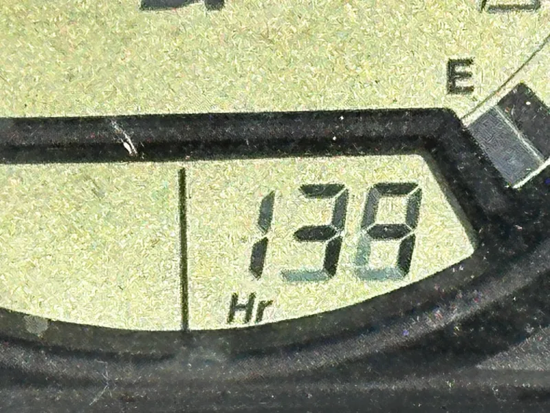 Slide: The Image of Close-up of 2012 Sea-Doo GTX 155 hour meter displaying 138 hours. - 8
