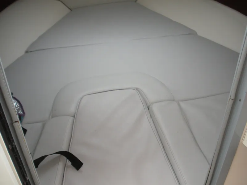 Slide: The Image of Interior cabin view of a 1998 Boston Whaler 23 Conquest boat. - 3