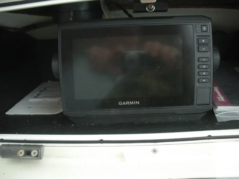 Slide: The Image of Garmin GPS device on 1998 Boston Whaler 23 Conquest boat dashboard. - 5