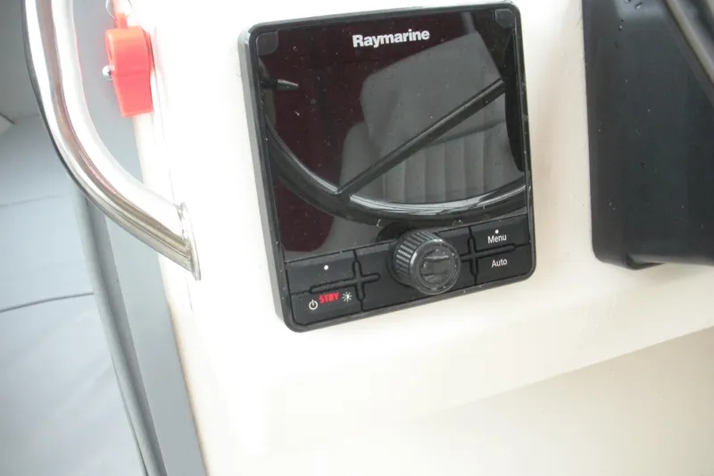 Slide: The Image of Raymarine control panel on 1998 Boston Whaler 23 Conquest boat. - 7