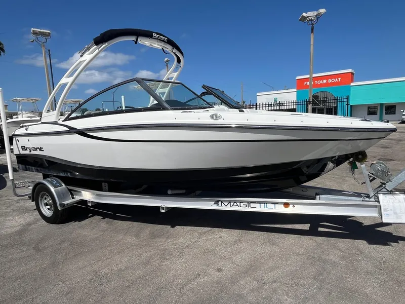 Slide: The Image of 2018 Bryant Speranza boat on a trailer under a clear blue sky. - 2