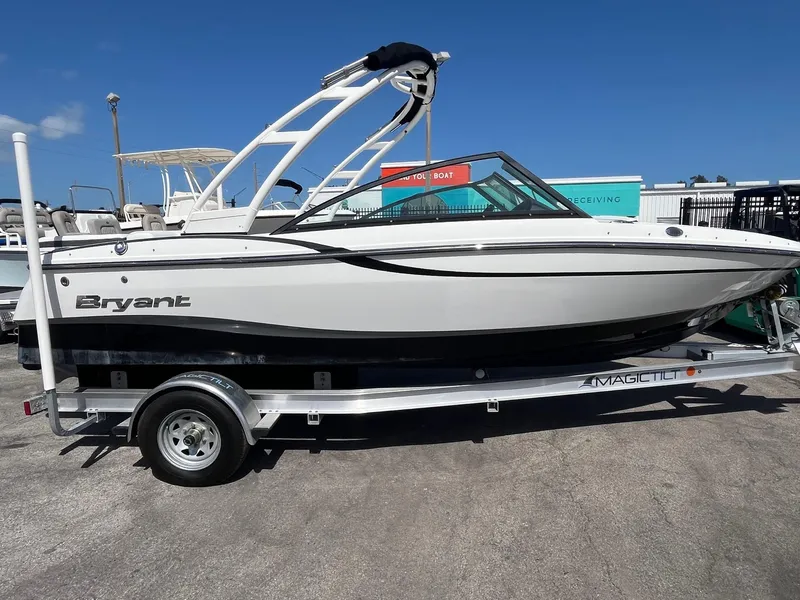 Slide: The Image of 2018 Bryant Speranza boat on trailer, white hull, sleek design, sunny day. - 3