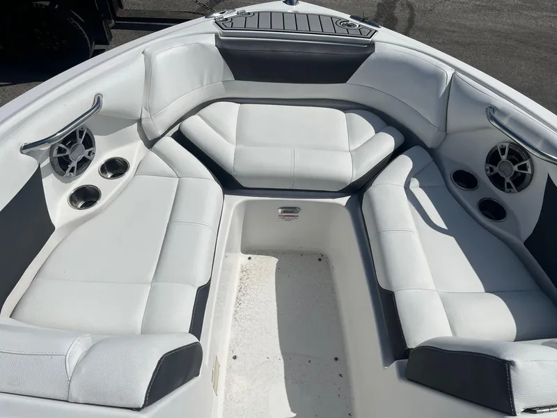 Slide: The Image of Luxurious 2018 Bryant Speranza boat interior with white seating and built-in speakers. - 5