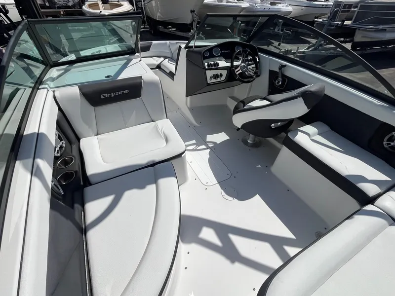 Slide: The Image of 2018 Bryant Speranza boat interior with sleek seating and modern dashboard design. - 7
