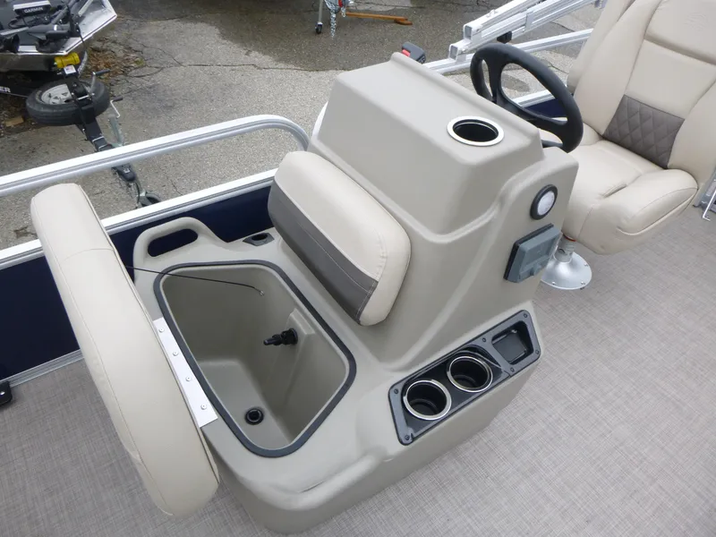 Slide: The Image of 2025 Sun Tracker Bass Buggy 16 XL Select boat interior with seating and storage. - 9