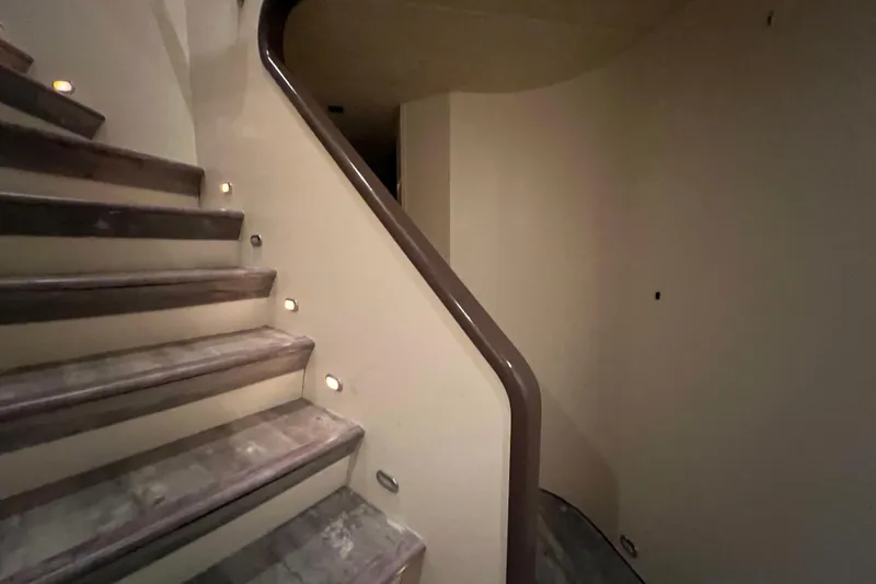 Slide: The Image of Curved staircase with built-in lights on a Falcon 106 yacht, 2001 model. - 28