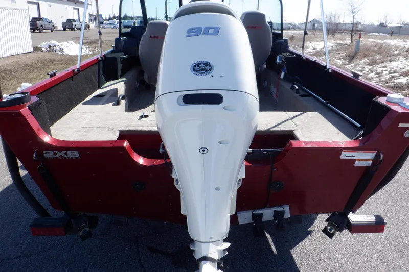 Slide: The Image of 2020 Alumacraft Competitor 165 Sport boat with 90 HP outboard motor, rear view. - 10