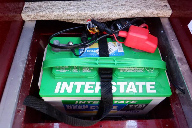 Slide: The Image of Interstate deep cycle battery in 2020 Alumacraft Competitor 165 Sport boat compartment. - 25