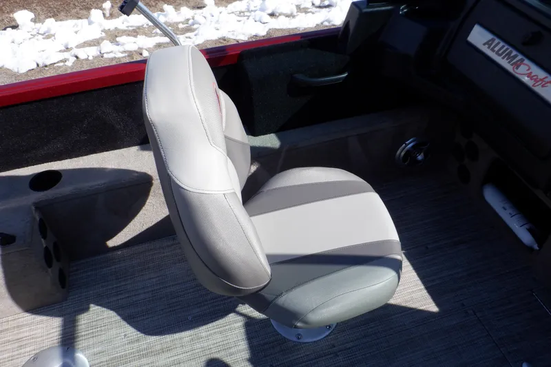 Slide: The Image of 2020 Alumacraft Competitor 165 Sport boat seat, gray upholstery, interior view. - 38