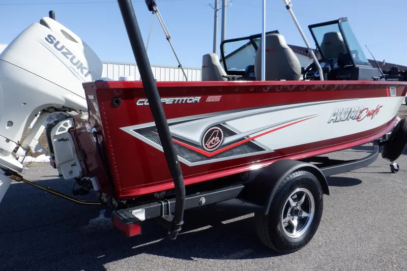 Slide: The Image of 2020 Alumacraft Competitor 165 Sport boat with Suzuki engine, red and white design. - 4