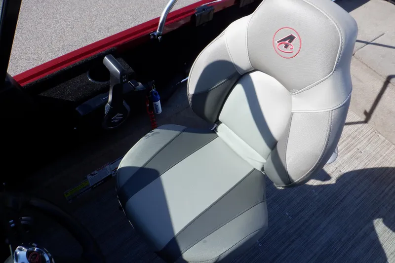 Slide: The Image of 2020 Alumacraft Competitor 165 Sport boat seat, gray and white design, on deck. - 40