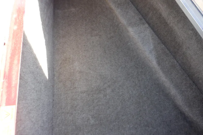 Slide: The Image of Carpeted interior of 2020 Alumacraft Competitor 165 Sport boat. - 46