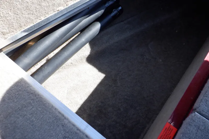 Slide: The Image of Storage compartment in a 2020 Alumacraft Competitor 165 Sport boat. - 48