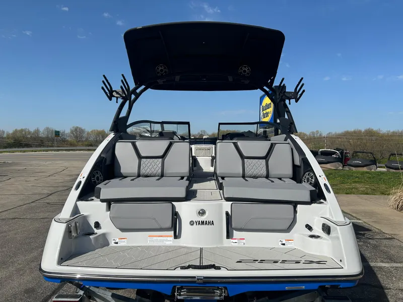 Slide: The Image of 2025 Yamaha Boats 255XD, rear view, showcasing seating and sleek design. - 5
