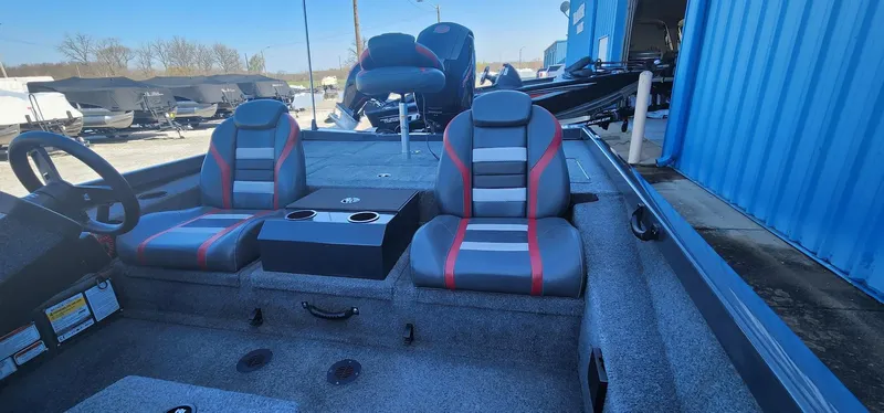 Slide: The Image of 2022 Ranger RT198P boat interior with dual seats and steering wheel. - 5