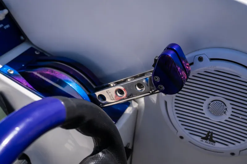 Slide: The Image of Throttle control and speaker on a 2000 Cigarette 38' Top Gun boat. - 20