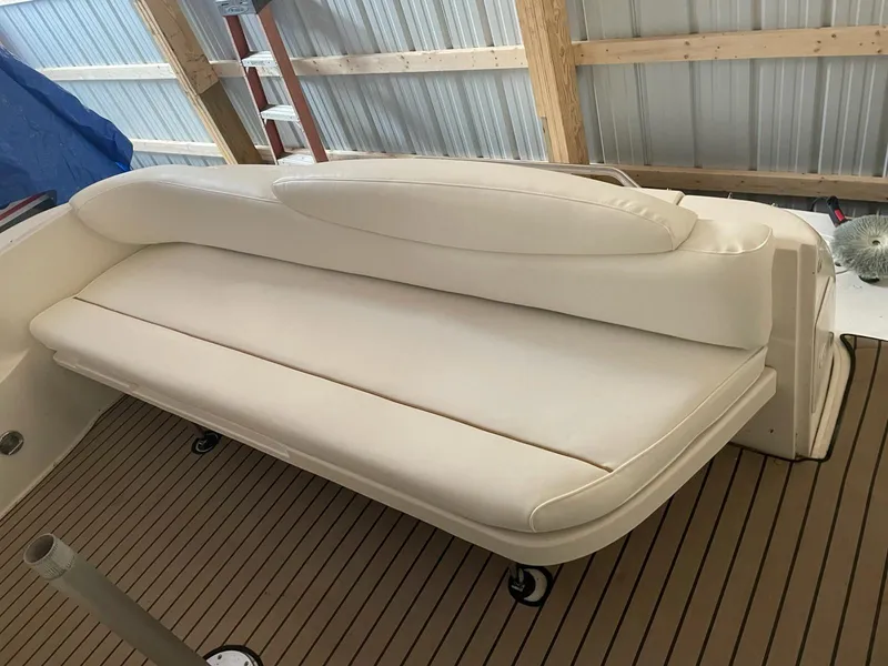 Slide: The Image of Cream-colored seating on a 2000 Sea Ray 340 Sundancer boat deck. - 7